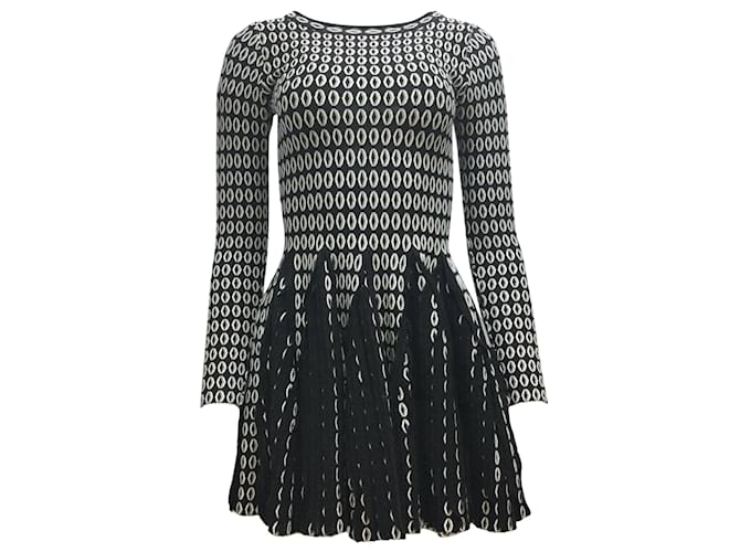 ALAÏA Black / White Printed Long Sleeved Knit Fitted Flared Pleated Mini Cocktail Dress Wool  ref.937304