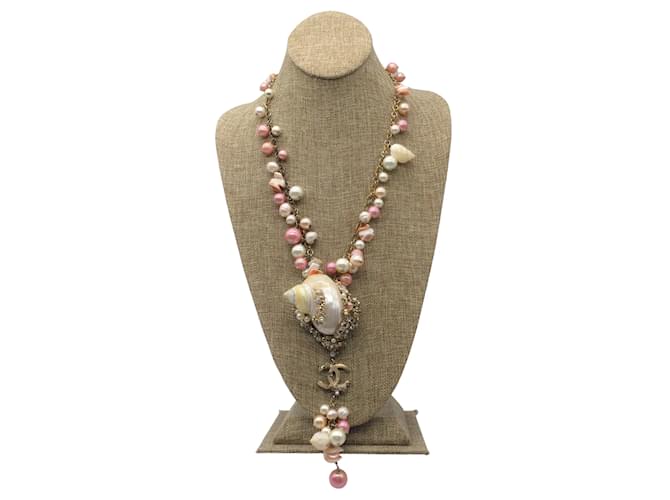 Chanel Pink / Ecru Cc Logo Seashell Pendant Crystal Embellished Imitation Pearl Long Necklace  ref.939514