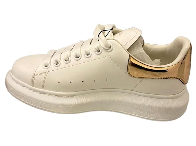 Alexander Mcqueen white and rose gold sneakers Leather  ref.940947