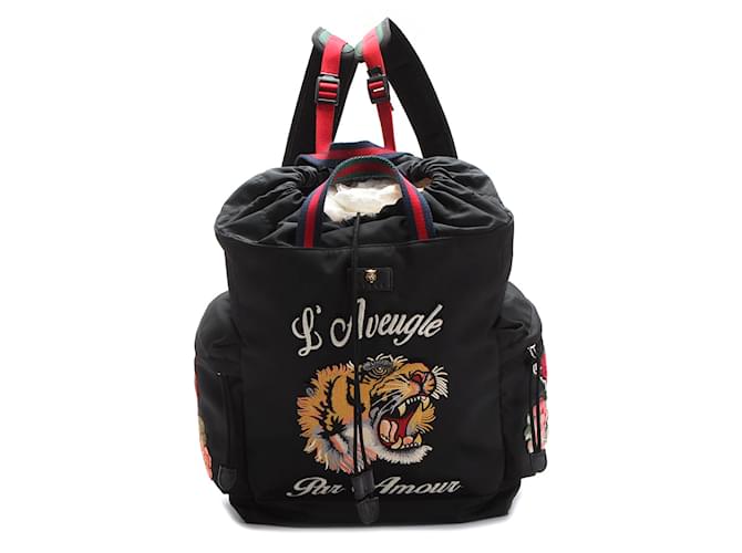 Gucci backpack hotsell with lion