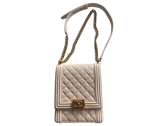 Le Boy Bolsa Chanel North South Boy em couro caviar bege