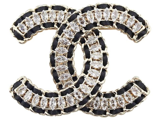 Chanel Silver CC Rhinestone Brooch Black Silvery Metal ref.947899 - Joli  Closet