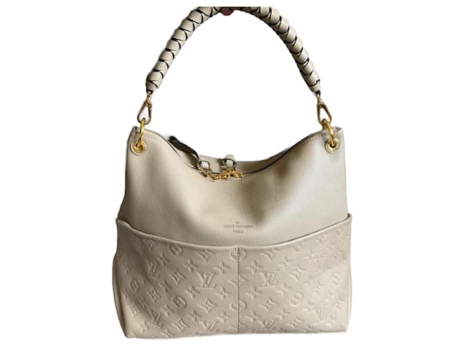 Maida Hobo Monogram Empreinte Leather - Handbags