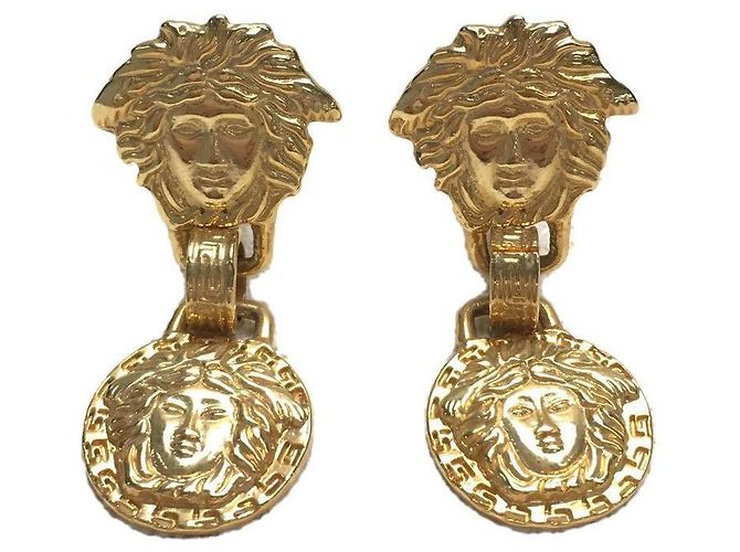 *Orecchini in oro Gianni Versace