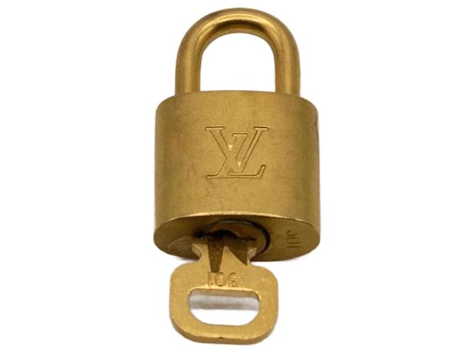 Louis Vuitton Brass padlock Golden Metal  ref.952680