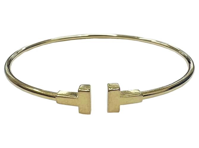 Tiffany & Co T Golden Yellow gold  ref.953101