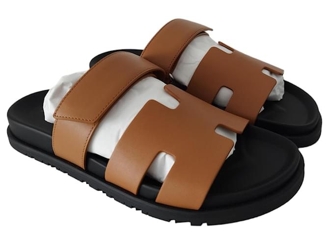 Hermès Hermes Chypre-Sandalen aus naturbraunem Leder und schwarzer Sohle  ref.955062
