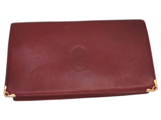 Cartera Cartier de piel rojo oscuro Burdeos