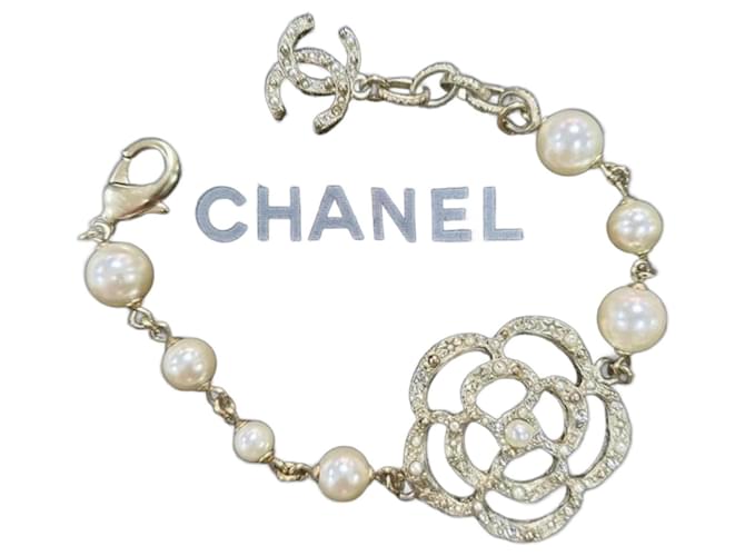 Chanel Gold Camellia and Faux Pearl Bracelet Golden Metal ref.956937 - Joli  Closet