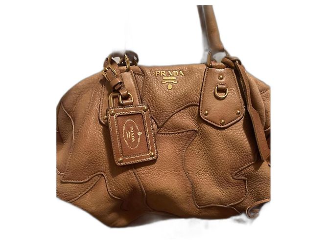 Daino Sac à main Prada en fourrure camel à franges