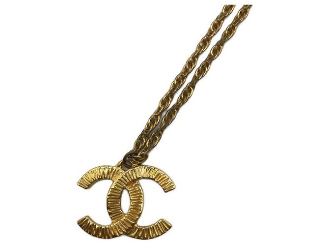 ***Collar CHANEL marca coco Dorado