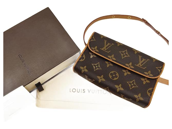 Louis Vuitton Florentine clutch bag in monogram canvas Brown Cloth  ref.1000755
