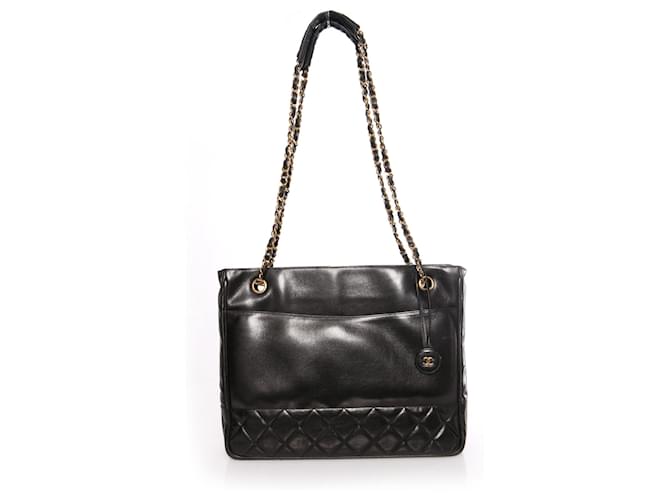 Chanel, Cabas vintage en cuir de veau matelassé noir/sac porté épaule avec détails dorés.  ref.1001998