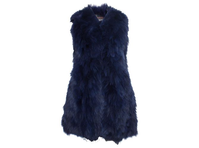 Autre Marque ADN, abrigo de piel azul sin mangas.