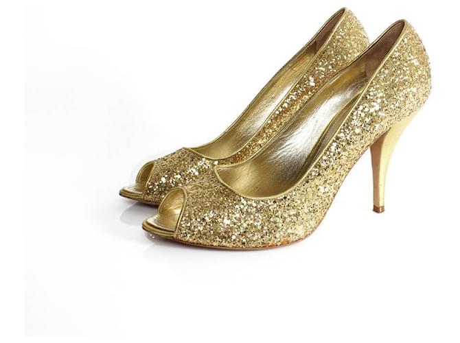 Autre Marque Pablo Warmer, zapatos de salón con purpurina de piel dorada. Dorado Cuero  ref.1002432