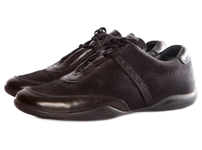 Prada, zapatillas negras con logo de Prada. Negro Cuero  ref.1002481