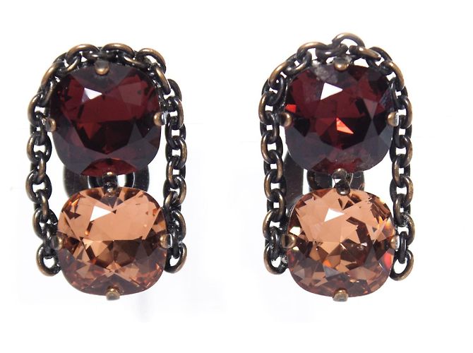 Autre Marque Daniel Swarovski, marrón con pendientes de clip de bronce. Castaño