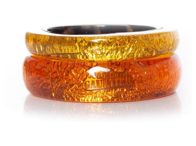 Autres bijoux Jean Paul Gaultier Jean-Paul Gaultier, Bracelets joncs époxy Polyester Orange Jaune  ref.1002623