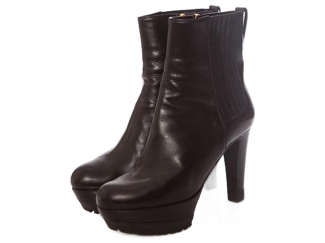 sergio rossi, Black leather platform boots in size 36.5.