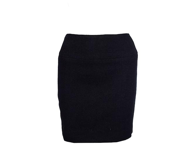 Chanel, Vintage black boucle skirt. Wool  ref.1002994