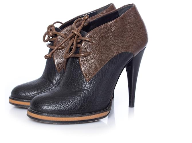 balenciaga, Kaki/black leather lace-up ankle shoots.  ref.1003037