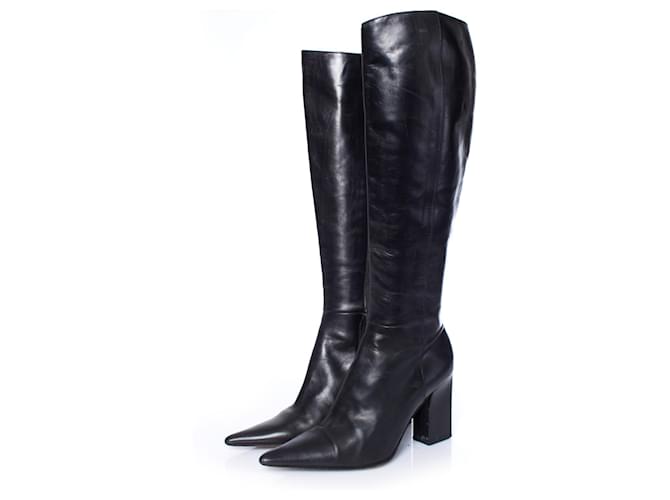 Michel Perry, Black leather boots with pointed toe.  ref.1003038