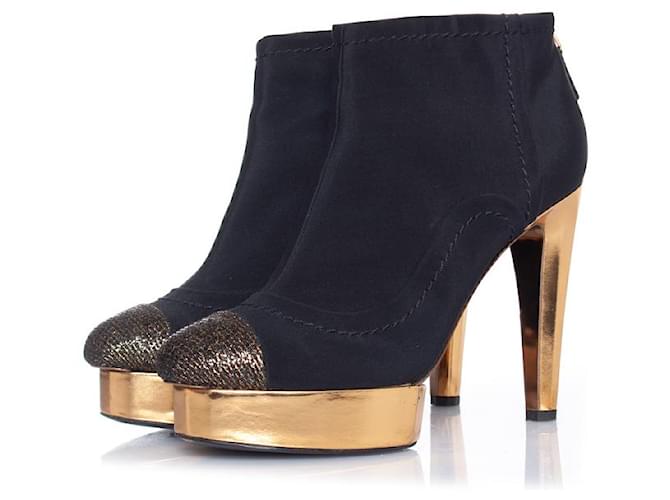 Chanel, Black ankle platform boots with gold heel
