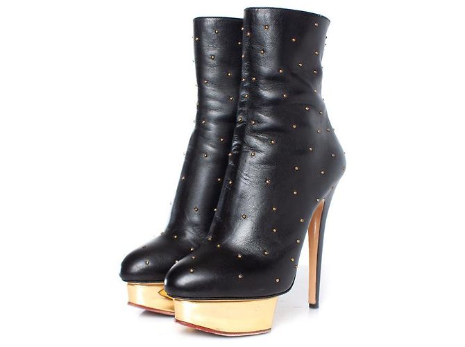 Charlotte Olympia Charlotte Olimpia, botas de plataforma de cuero Negro