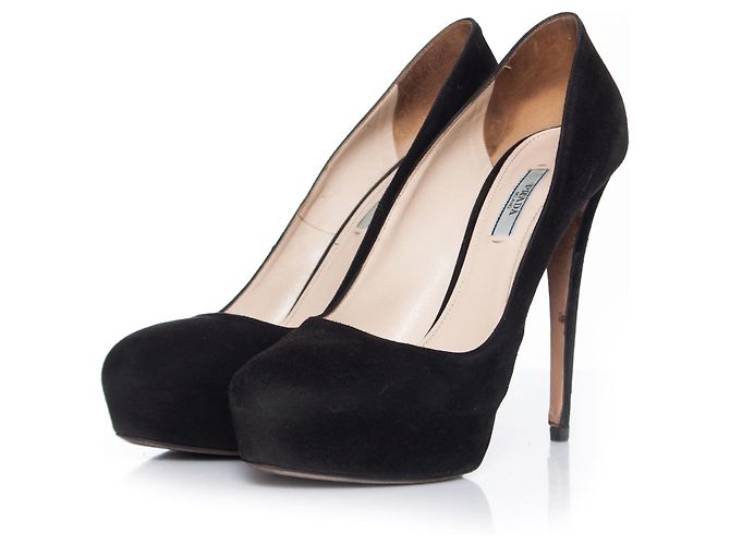 Prada, Black suede platform pumps.