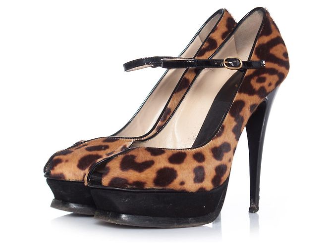 YVES SAINT LAURENT, Leopard printed calf tributes. Brown