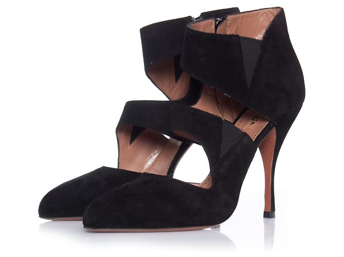 Alaïa Azzedine Alaia, Black suede curly ankle boots.