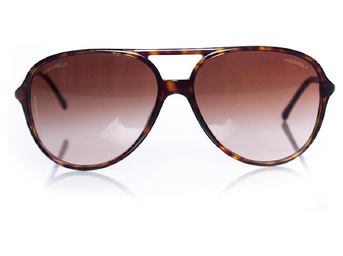 Chanel, Aviator in tortoise print Brown  ref.1003662