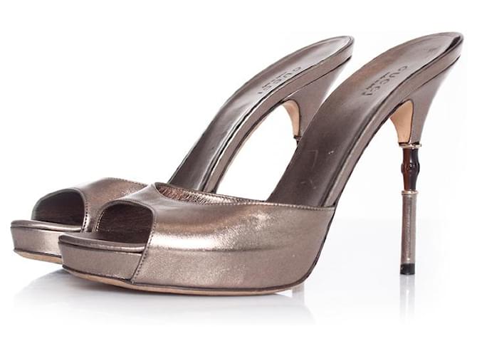 gucci, Metallic leather mule sandal with bamboo heel Golden  ref.1003901