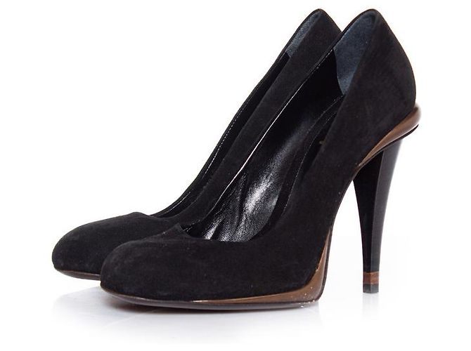 Fendi, black suede and bronze pump.