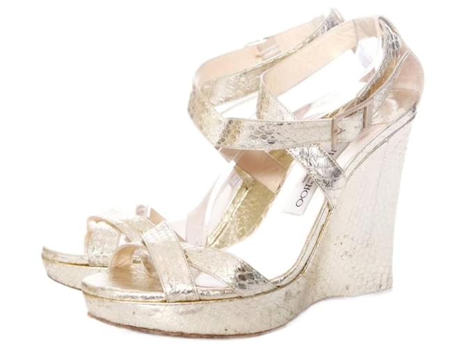 Jimmy Choo, gold leather wedge in snake print in size 39.5. Golden  ref.1004067