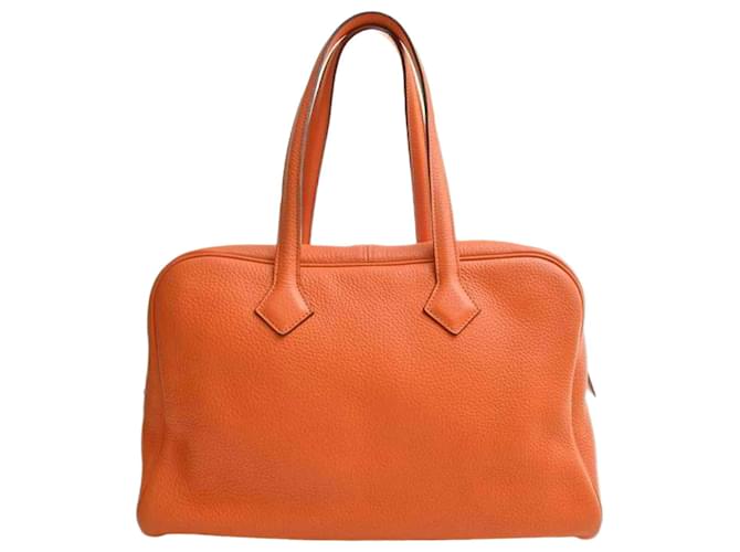 Hermès Victoria Naranja Cuero  ref.1004345