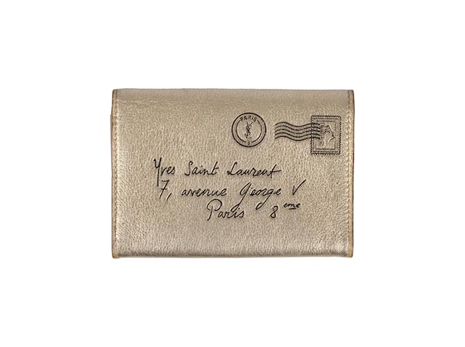 Porta-cartões de couro Yves Saint Laurent Dourado  ref.976784