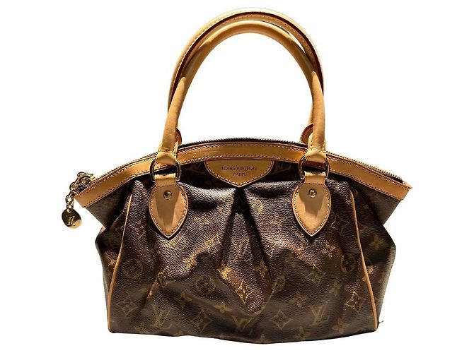 Louis Vuitton Tivoli PM bag in like new condition! Multiple colors