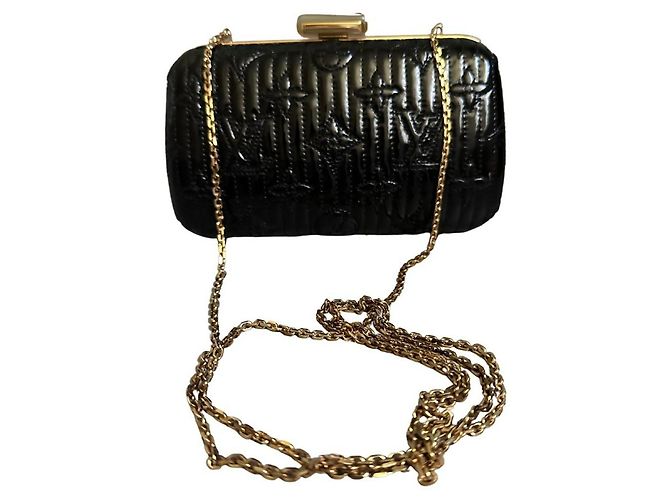 LOUIS VUITTON edición limitada Monogram Motard Minaudiere negro