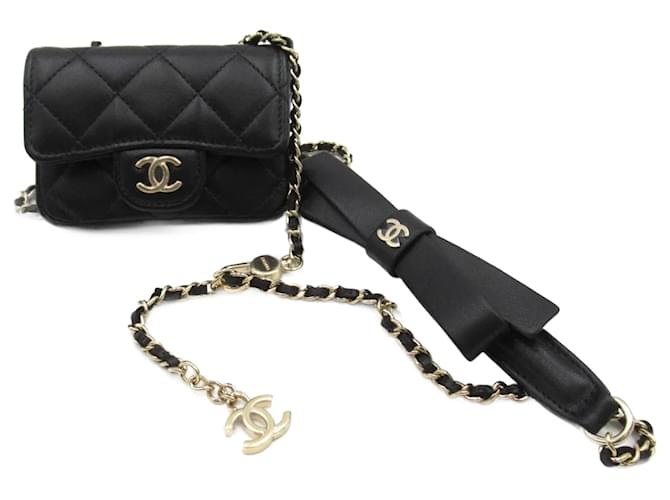 Chanel CC Quilted Leather Bow Chain Mini Flap Bag Black Lambskin ref.981544  - Joli Closet
