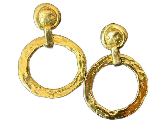 Boucles d'oreilles dorées Yves Saint Laurent 