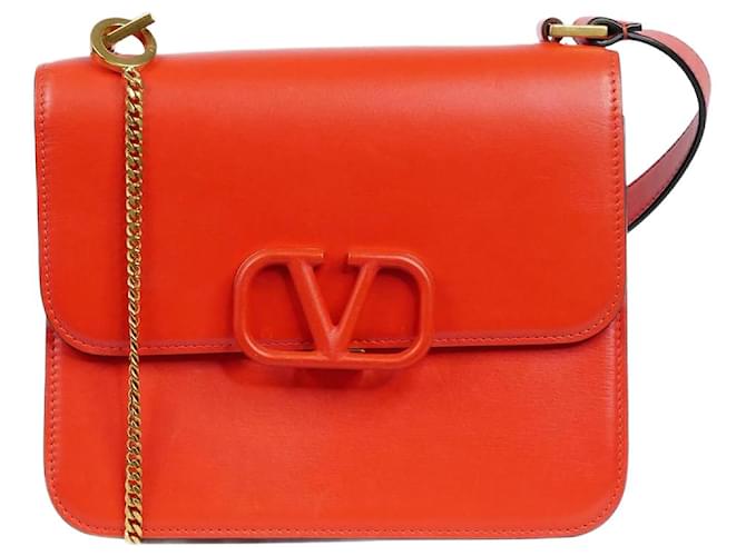 Valentino Orangefarbene Umhängetasche mit V-Logo Leder  ref.987039