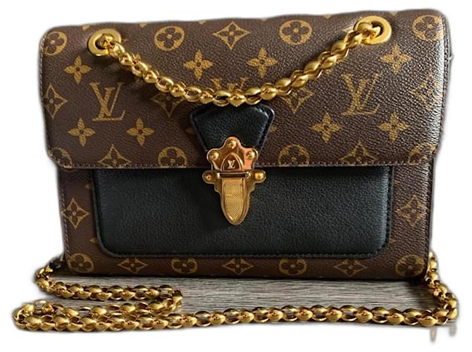 Louis Vuitton Victoire Handbag Monogram Canvas and Leather Brown