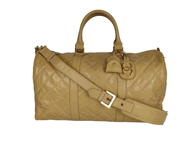 Chanel Chanel quilted travel bag in beige patent leather ref