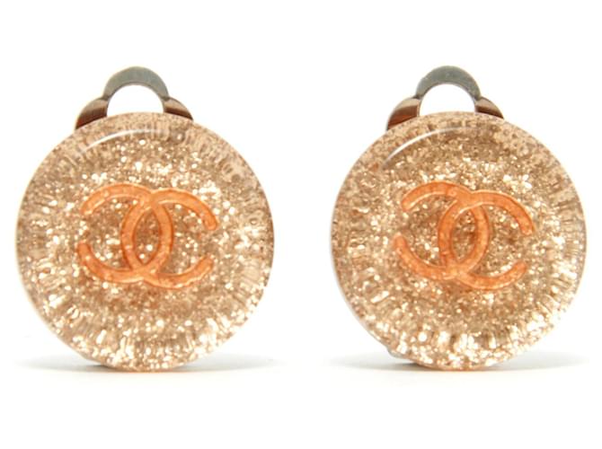 Chanel Champagne Glitter clips Plastique Doré  ref.997156
