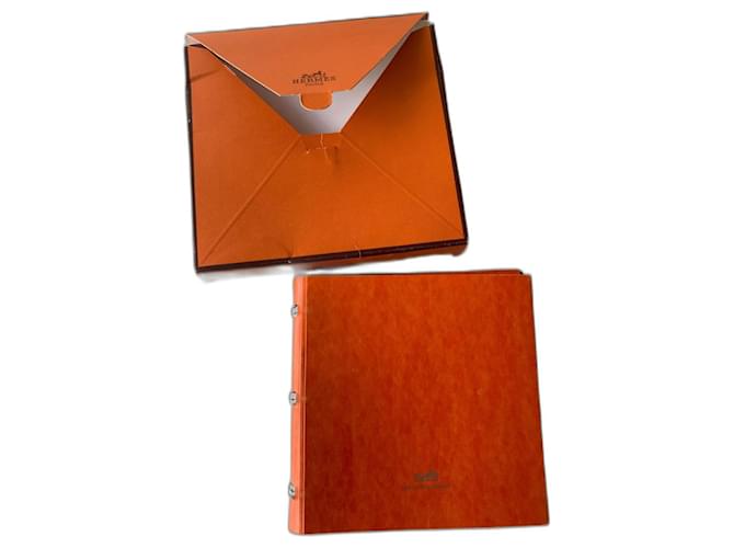 Hermès Clutch bags Orange Plastic  ref.1013905