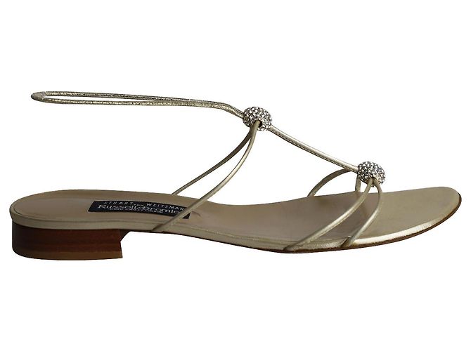 Stuart Weitzman Crystal Embellished Flat Sandals in Gold Leather