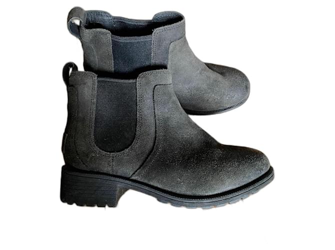 Novas botas de couro forradas de pele UGG Preto  ref.1023517