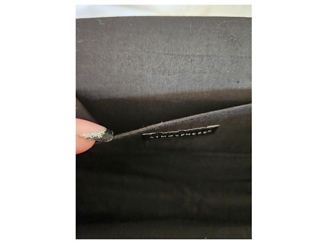 Autre Marque Atmosphere Clutch aus schwarzem Leder
