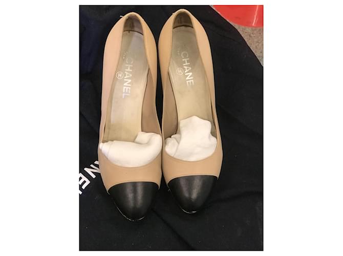 Chanel tan and hot sale black shoes